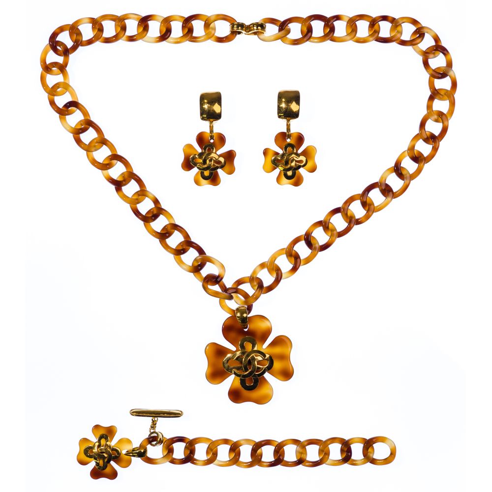 Appraisal: CHANEL JEWELRY SUITE items from the Clover collection including a