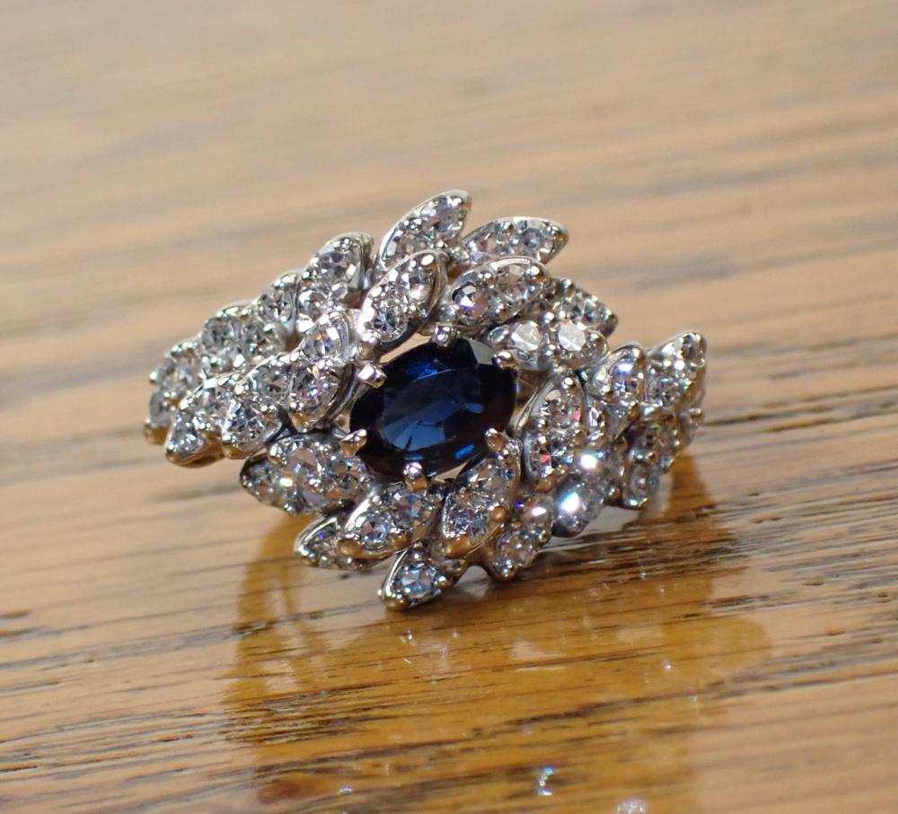 Appraisal: DIAMOND SAPPHIRE AND FOURTEEN KARAT GOLD RING The k white