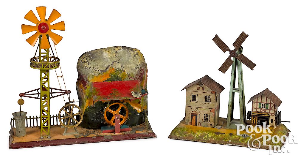 Appraisal: Two German windmill steam toy accessories Two German painted tin