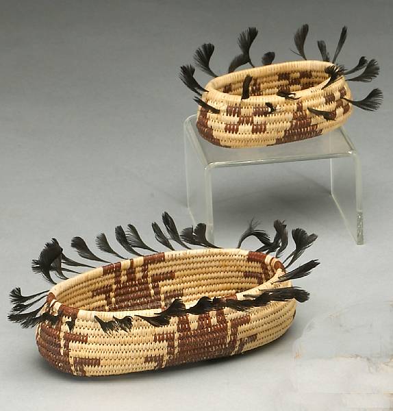 Appraisal: Two Pomo oval gift baskets Each similarly conceived with four