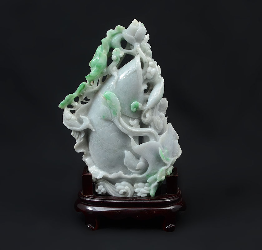 Appraisal: CHINESE CARVED JADEITE FIGURAL FISH Mottled apple green jadeite or