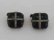 Appraisal: A pair of French jet and diamond cuff links the