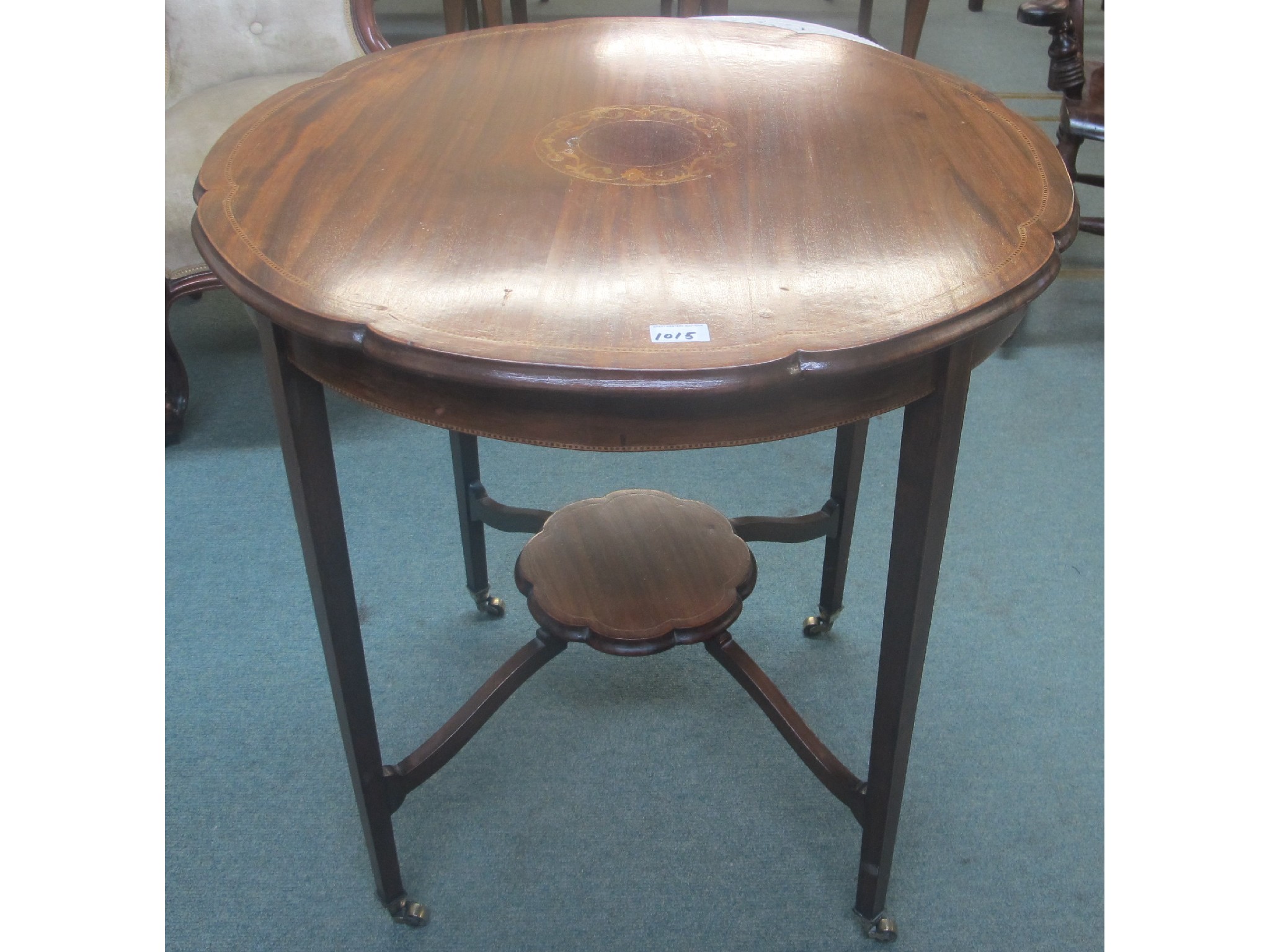 Appraisal: An Edwardian mahogany occasional table