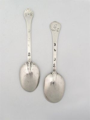 Appraisal: A William and Mary lace-back trefid spoon scratched 'WE' by