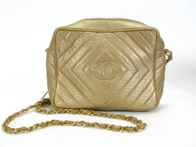 Appraisal: Chanel gold leather finish purse with chevron and logo quilting