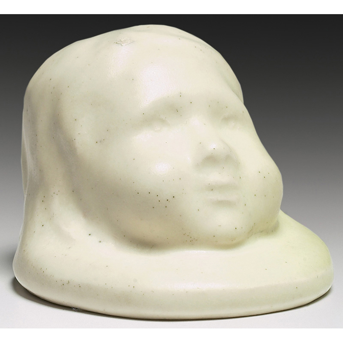 Appraisal: Rare Rookwood sculpture head of a child covered in an