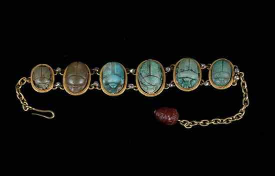 Appraisal: EGYPTIAN REVIVAL YELLOW GOLD AND SCARAB BRACELET Six graduated scarabs