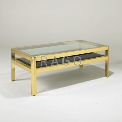 Appraisal: KARL SPRINGER Coffee table USA s Polished brass glass acrylic