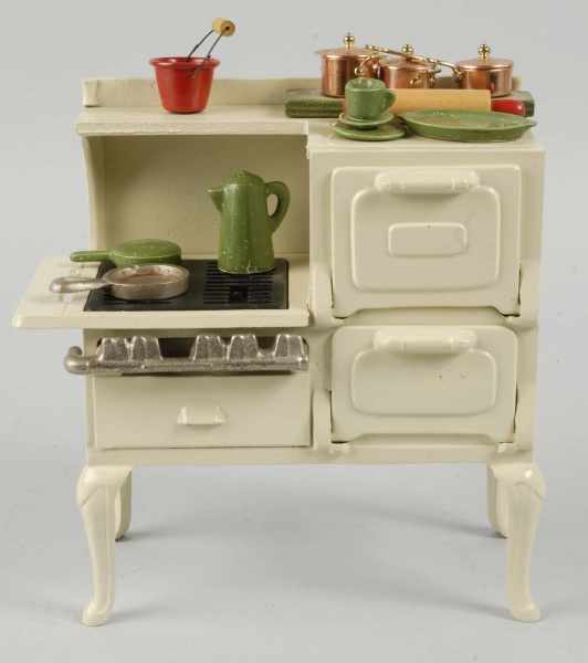 Appraisal: Cast Iron Arcade Roper Children's Stove Description Includes eight accessories