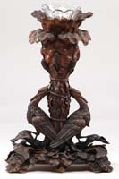 Appraisal: BLACK FOREST WALNUT FIGURAL EPERGNE The tall epergne made of