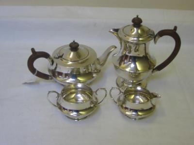 Appraisal: A FOUR PIECE TEA SET of dished circular form the