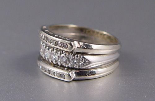 Appraisal: PLATINUM K AND DIAMOND TRIPLE BAND RING WITH DIAMONDS K