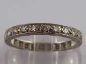 Appraisal: A white metal tests carat gold diamond eternity ring approx