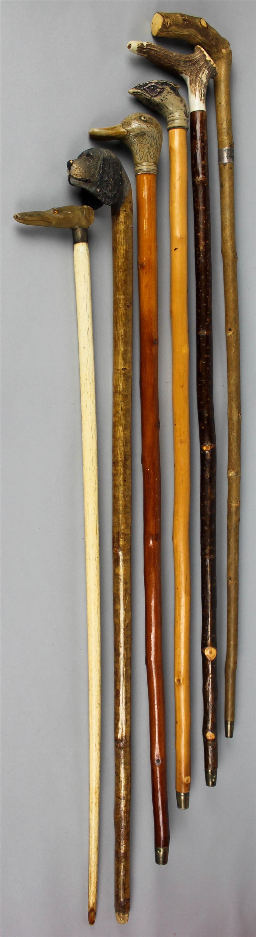 Appraisal: SIX WALKING STICKS WITH ASSORTED DECORATIVE HANDLES late th th