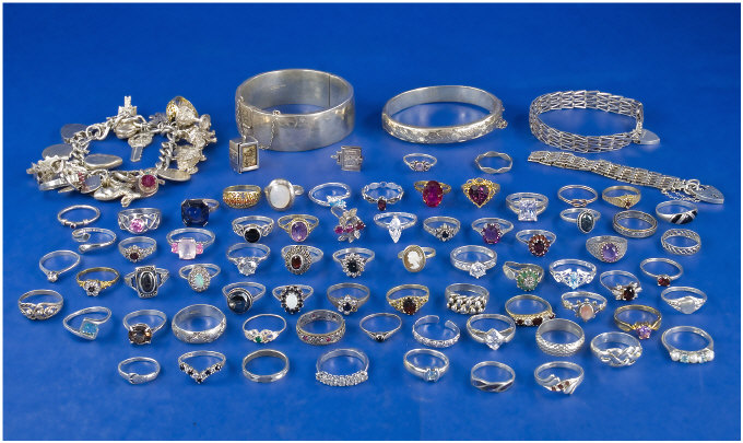 Appraisal: Collection Of Silver Jewellery Comprising Rings Bangles Bracelets Charm Bracelet