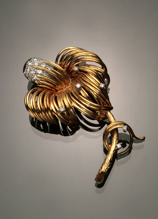 Appraisal: -Karat Yellow-Gold White-Gold and Diamond Floral Brooch The stamen and