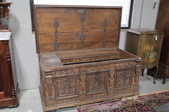 Appraisal: LARGE EUROPEAN COFFER Walnut having a paneled lid and elaborate