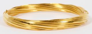 Appraisal: KT YELLOW GOLD TWIST BANGLE BRACELET KT YELLOW GOLD TWIST