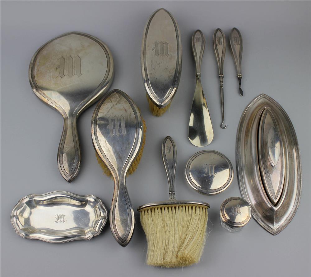 Appraisal: AMERICAN ELEVEN-PIECE SILVER MOUNTED DRESSER SET Simpson Hall Miller Co