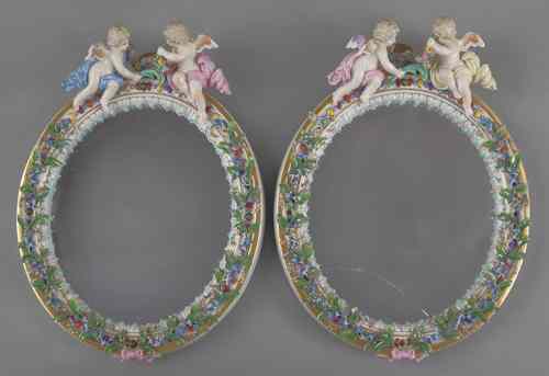 Appraisal: Pair of Meissen porcelain dressing mirrors with putti finials and