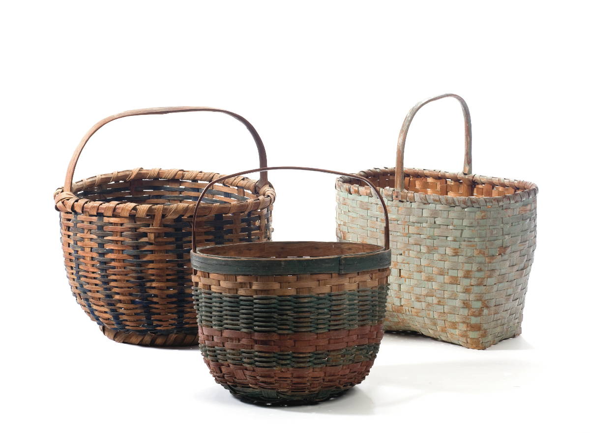 Appraisal: THREE PAINTED HANDLED SPLINT BASKETS Including two round examples and