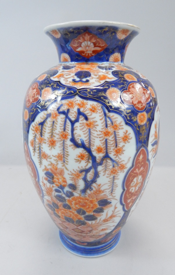 Appraisal: A late th early thC Japanese Imari baluster vase decorated