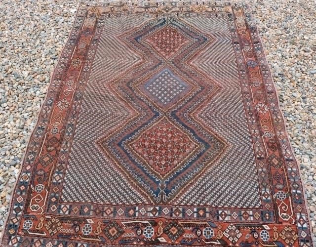 Appraisal: ANTIQUE ORIENTAL RUG SHIRAZ GEOMETRIC DESIGNS AGE APPROPRIATE EVEN WEAR