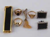 Appraisal: A mixed lot comprising three yellow metal tests gold rings