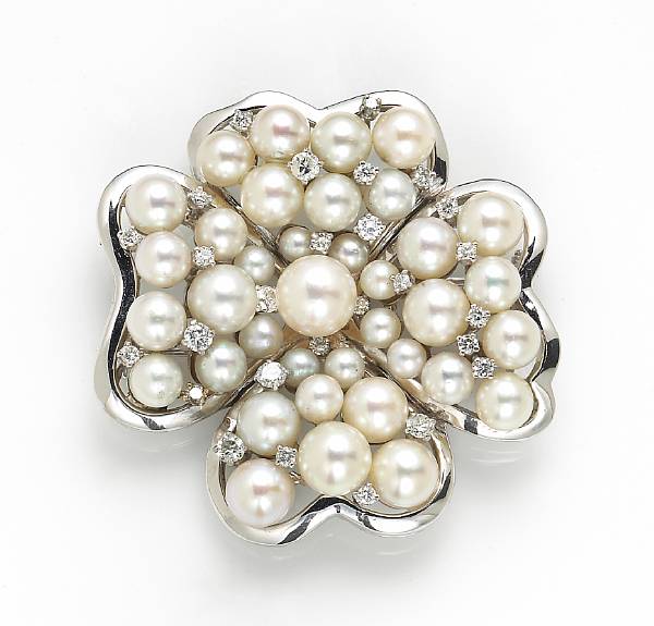 Appraisal: A cultured pearl diamond and eighteen karat white gold -leaf