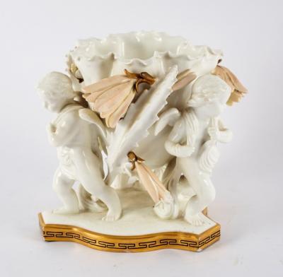 Appraisal: A Moore porcelain centrepiece modelled as a flowerhead on three