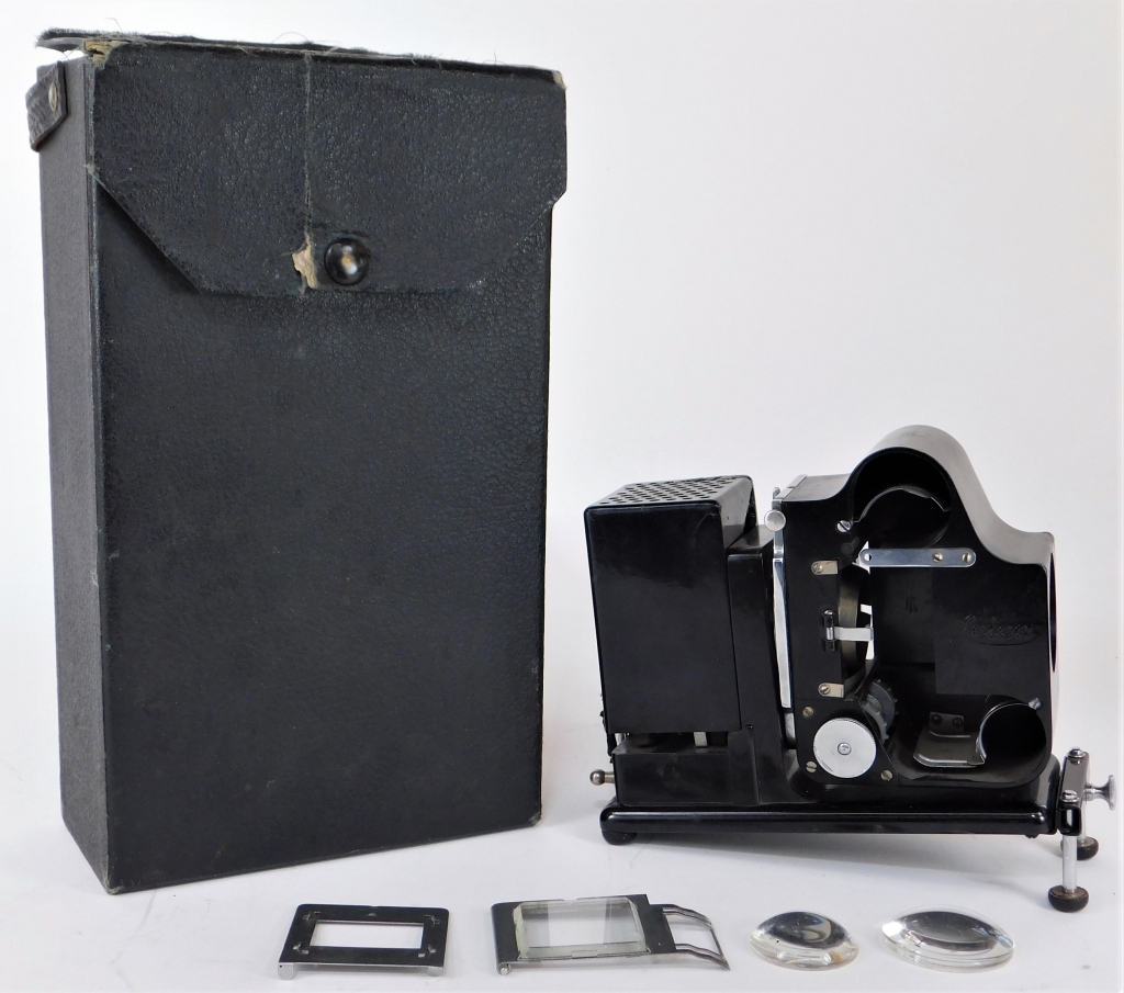 Appraisal: LEICA MINIATURE FILM PROJECTOR Leica Miniature film projector with original