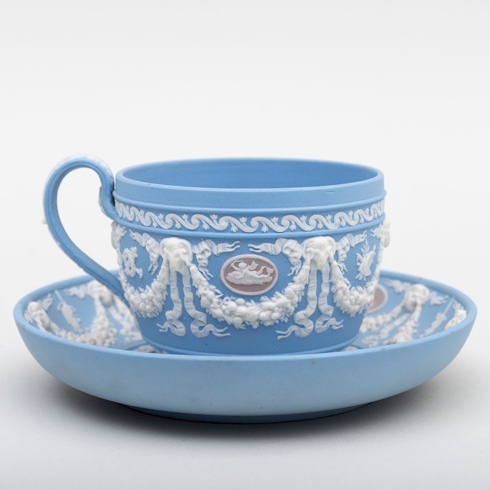 Appraisal: Wedgwood Three Color Jasperware Cup and Saucer Impressed mark decorated