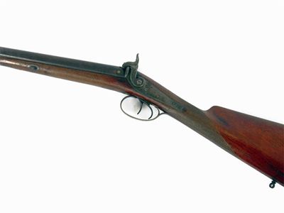 Appraisal: A double barrel percussion carbine with a walnut stock and