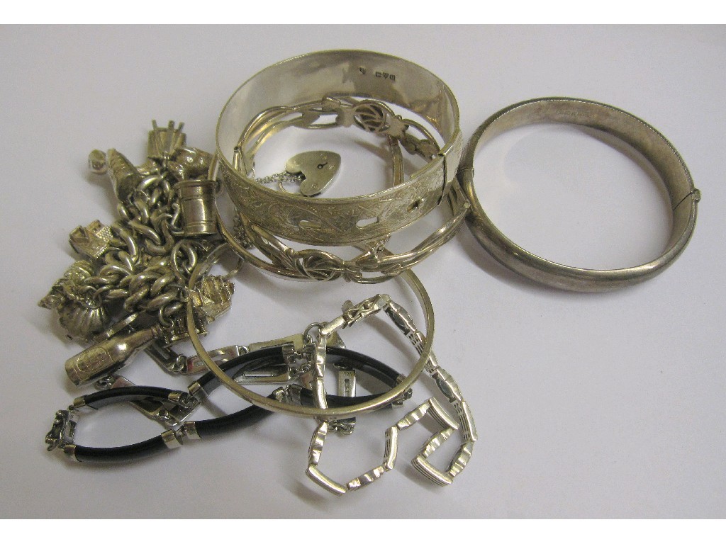 Appraisal: Lot comprising five silver bangles and four silver bracelets