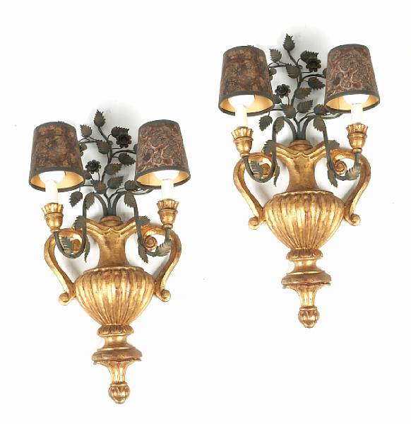 Appraisal: A pair of Italian Baroque style carved giltwood and toleware