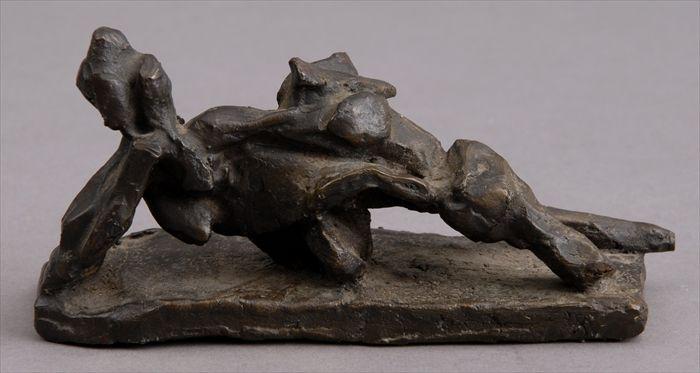 Appraisal: BRONZE OF A RECLINING NUDE x in