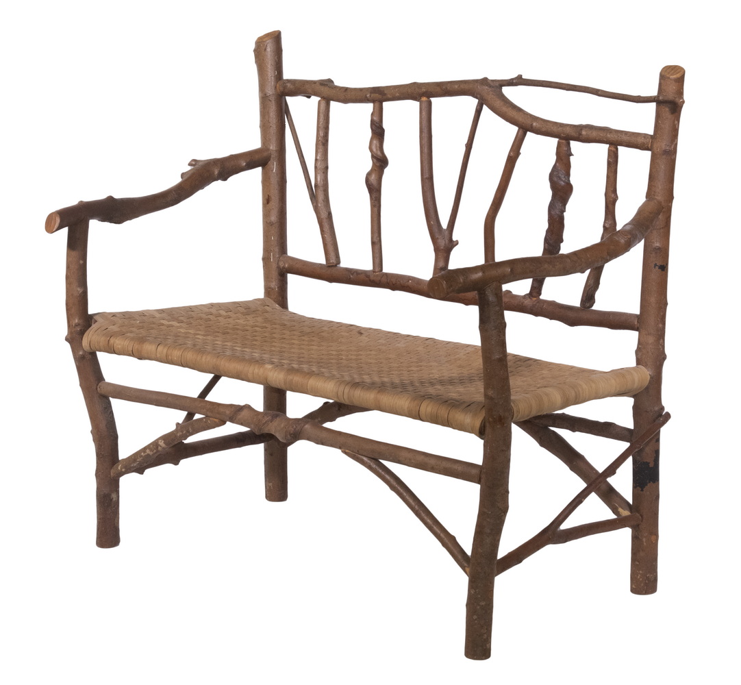 Appraisal: ADIRONDACK BENCH Twig Form Spindle Back Settee with woven splint