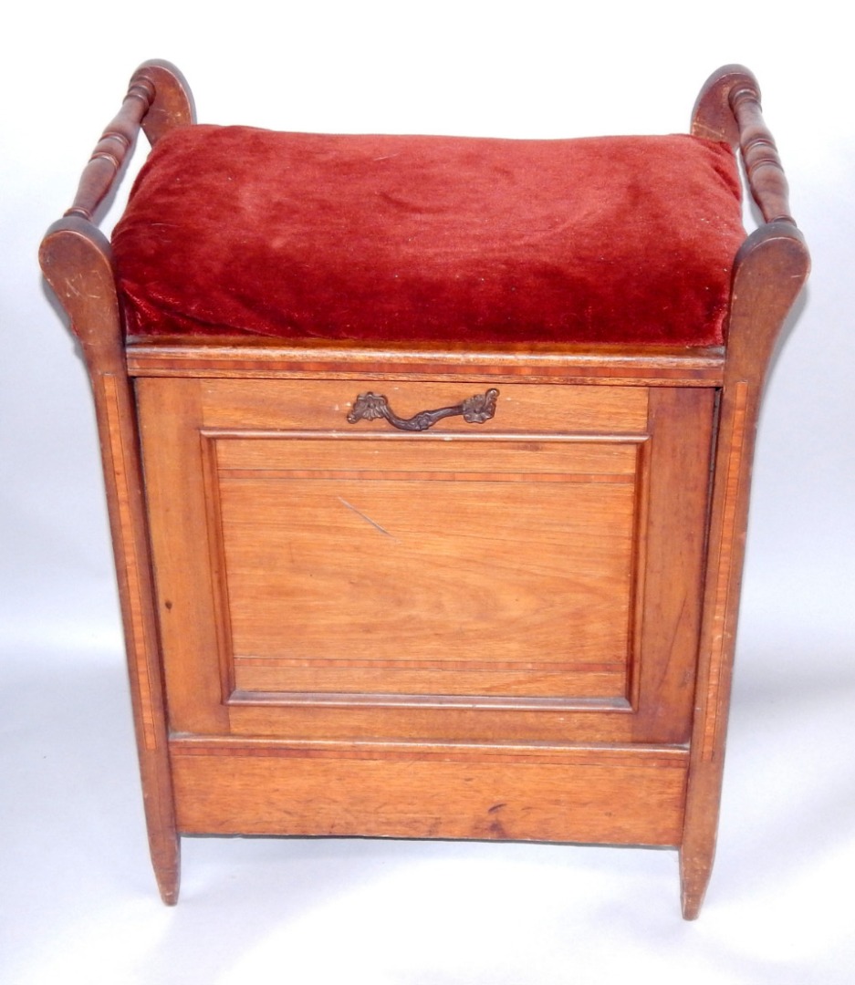 Appraisal: A Victorian mahogany and satinwood inlaid piano stool with an