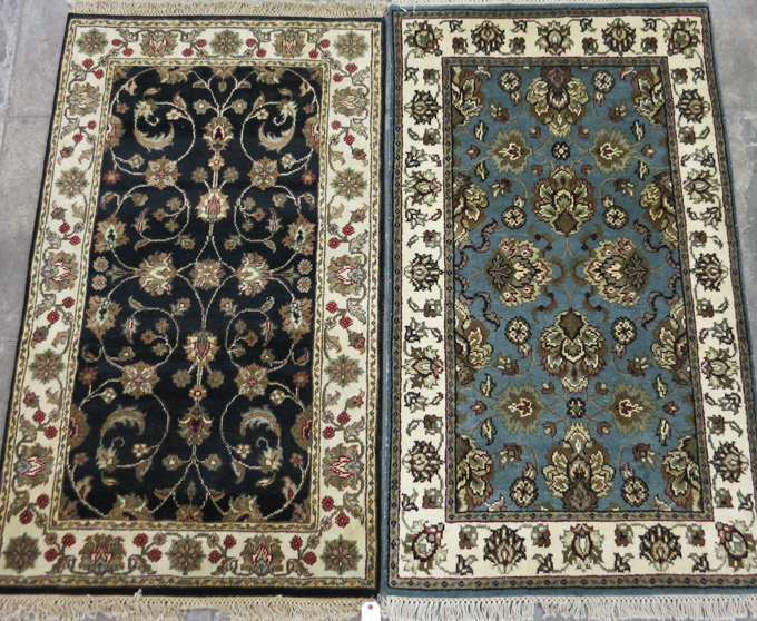 Appraisal: TWO HAND KNOTTED ORIENTAL AREA RUGS Indo-Persian ' x '