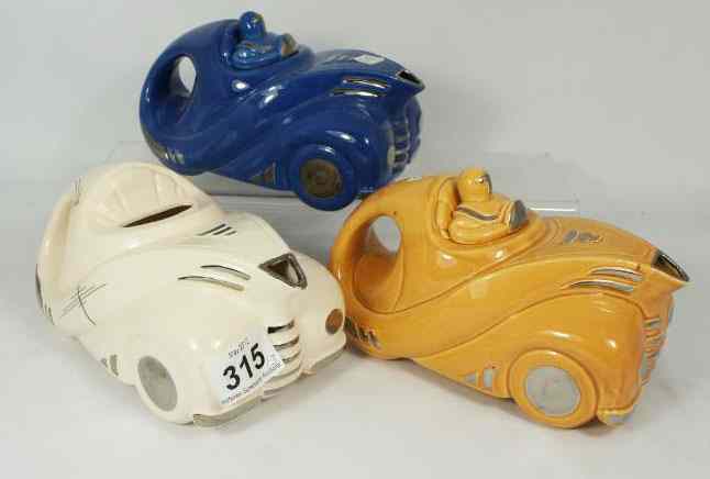 Appraisal: Cosmic Racing Car Tea Pots Andy Titcomb Cosmic Zoom -