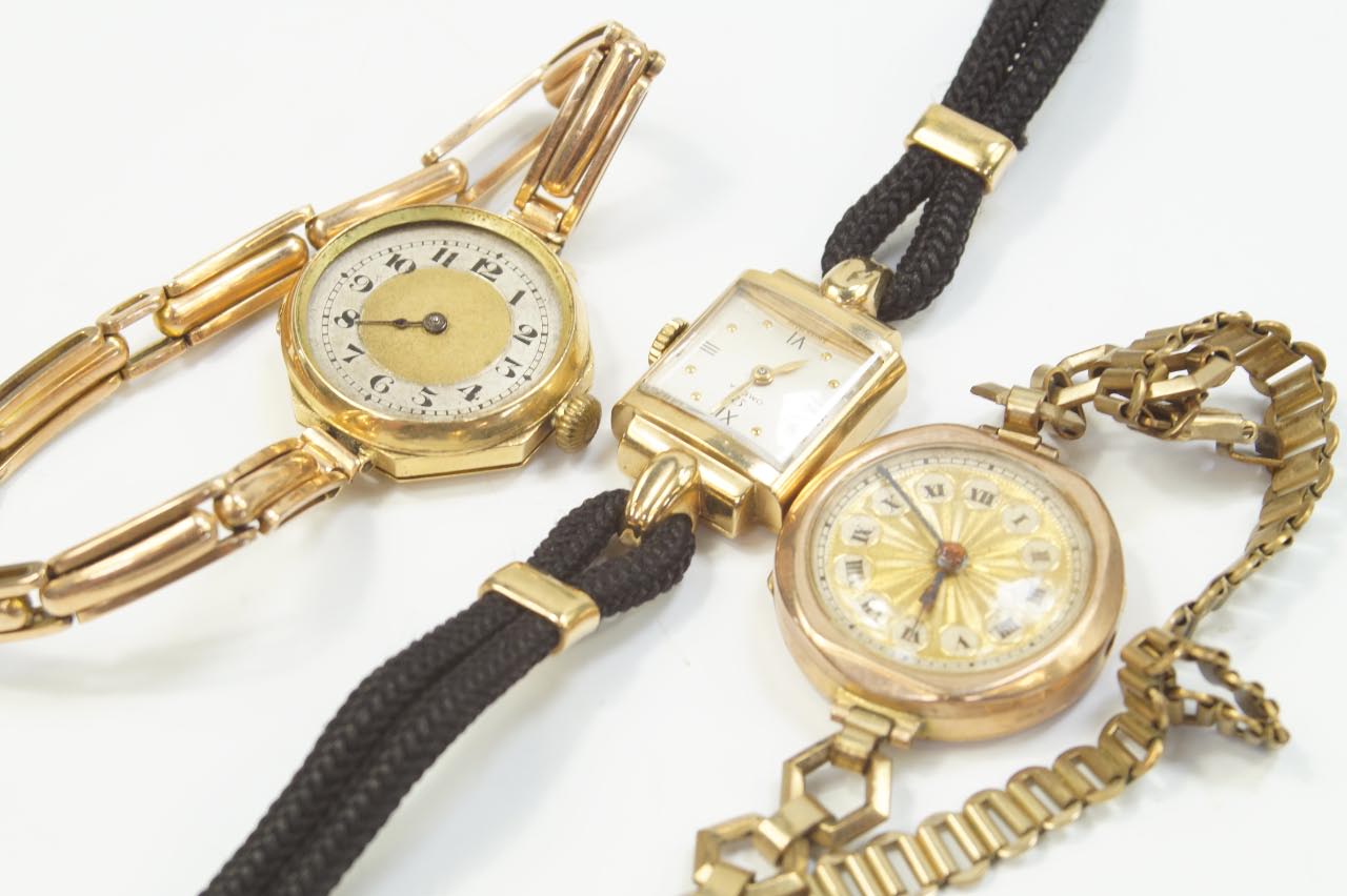 Appraisal: Three mid thC ladies' gold cased watches