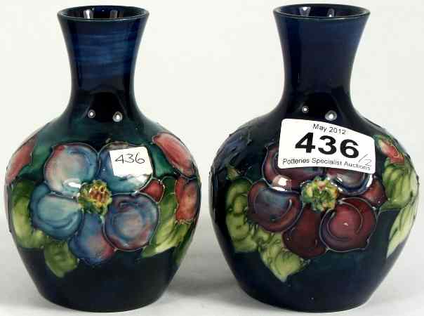 Appraisal: A pair of Moorcroft Vases decorated with a Clematis Design