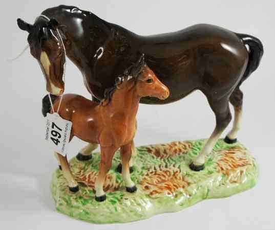 Appraisal: Beswick Brown Mare and Chesnut Foal on Base Model