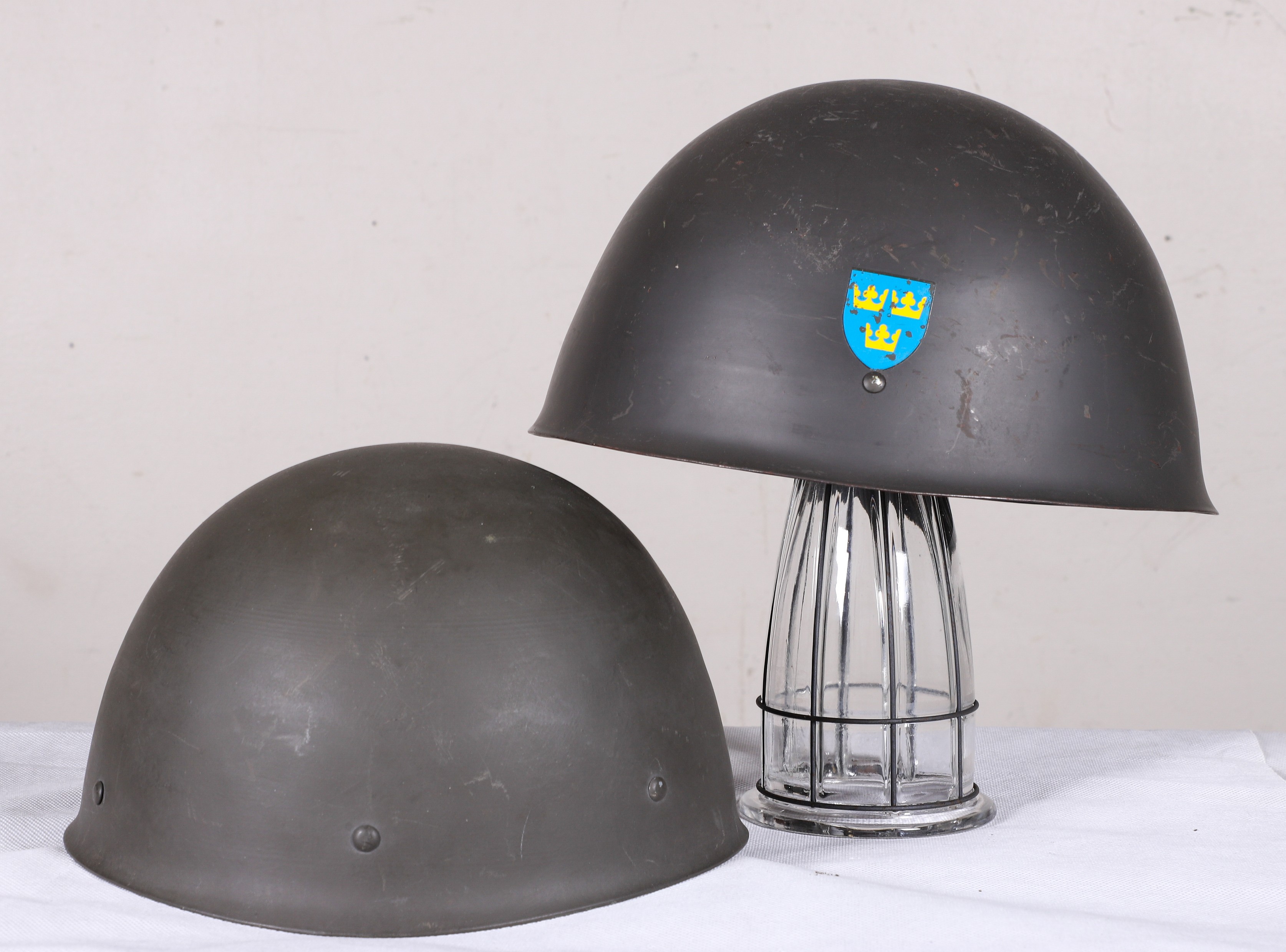 Appraisal: Swedish military helmets refurbished or repro to include M sz