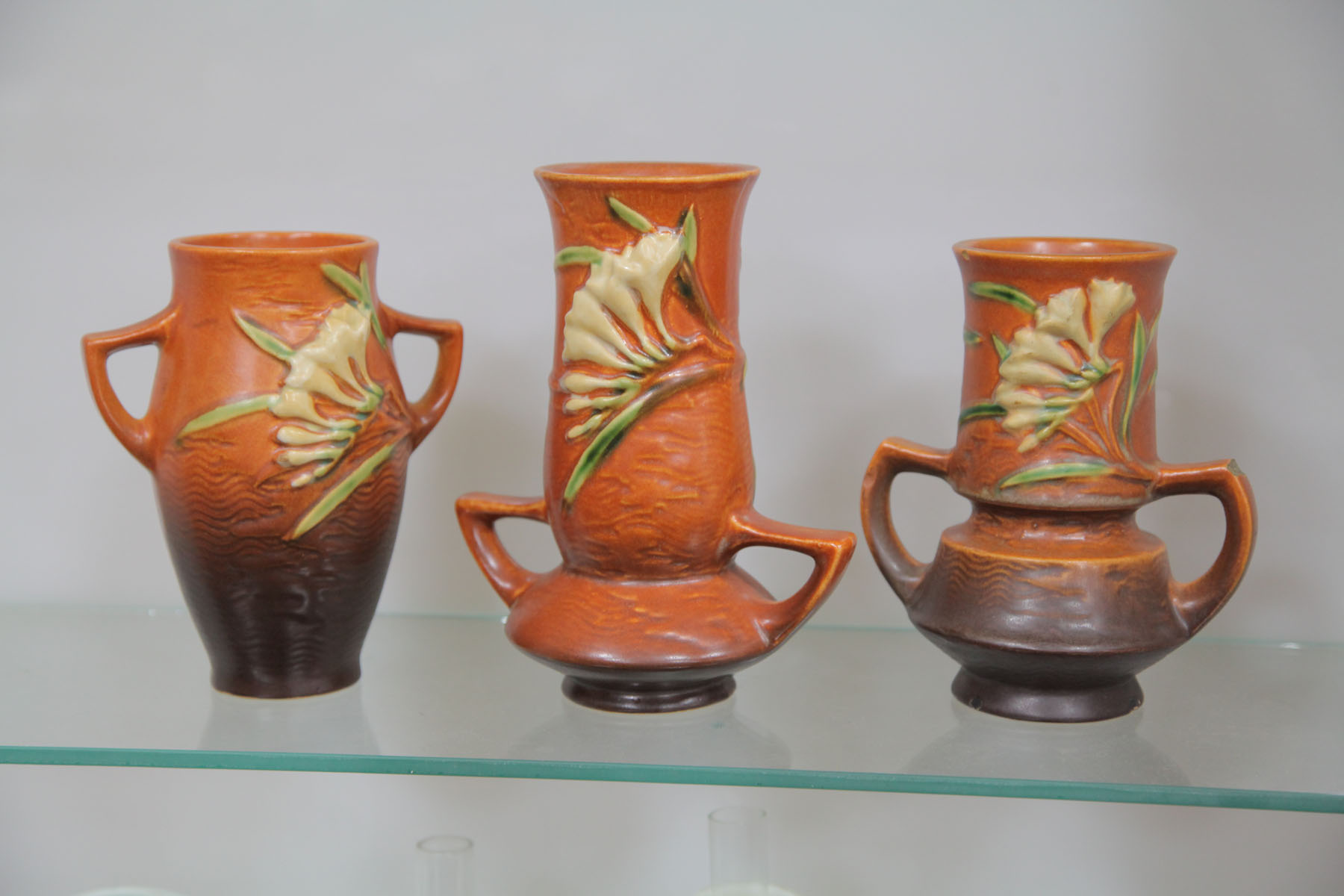 Appraisal: THREE ROSEVILLE VASES Ohio second half of th century Three