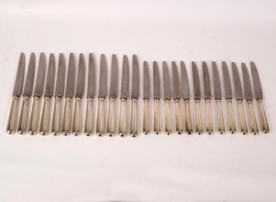 Appraisal: A set of twelve silver handled dessert knives and twelve