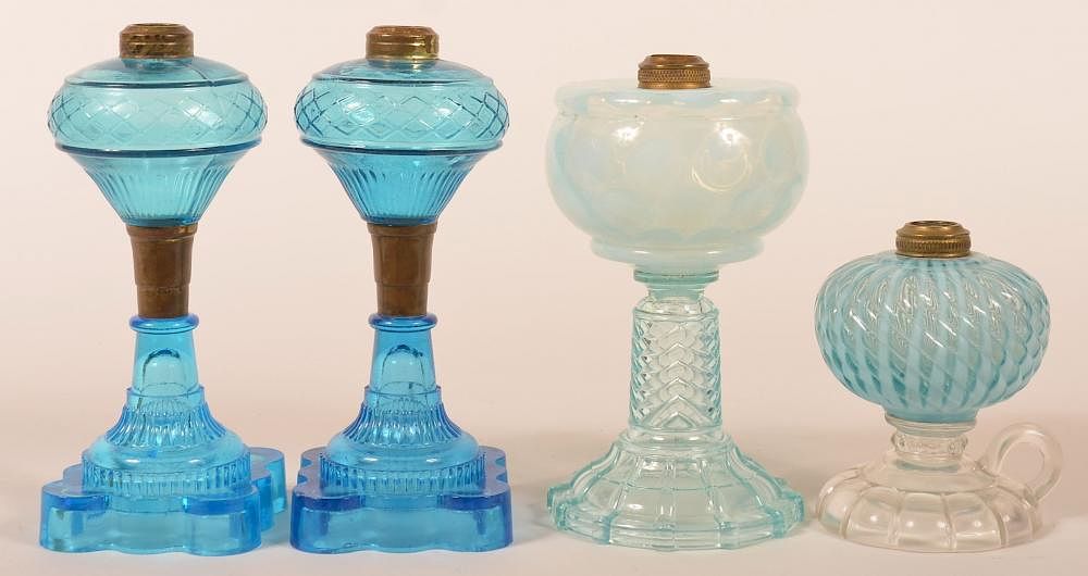 Appraisal: Four Various Glass Fluid Lamps Four Various Glass Fluid Lamps