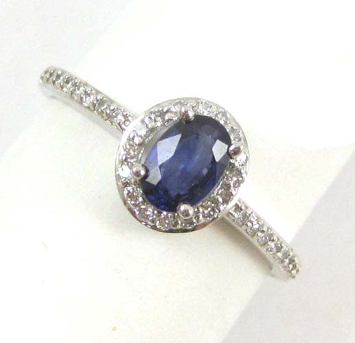 Appraisal: SAPPHIRE DIAMOND AND FOURTEEN KARAT WHITE GOLD RING featuring an