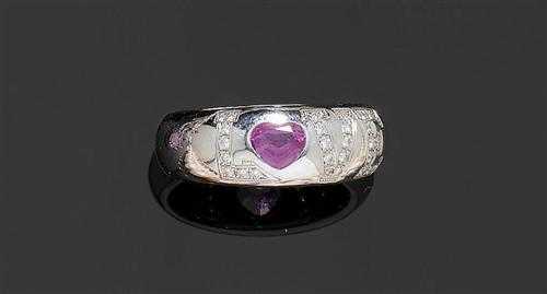 Appraisal: SAPPHIRE AND DIAMOND RING White gold Decorative convex band ring