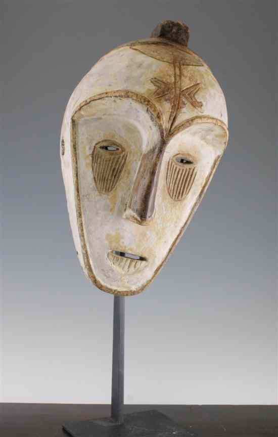 Appraisal: A West African carved and painted softwood tribal mask ins